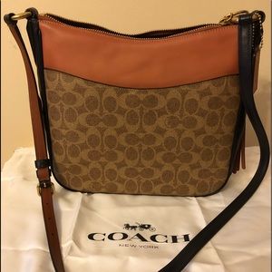 Coach Crossbody canvass & refined calf leather bag
